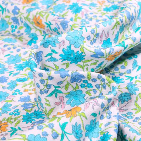 Tissu Jersey Coton  Sweet Flower Florentine bleu clair sur fond Blanc