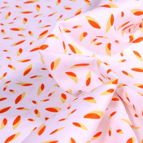 Tissu Coton imprimé Plumes jaunes et orange sur fond Blanc