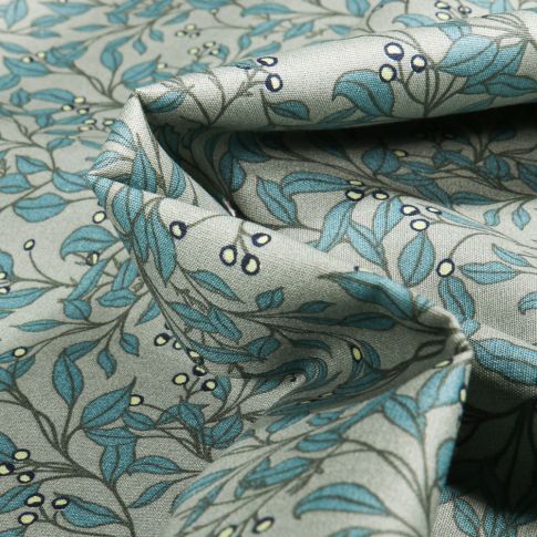 Tissu Coton imprimé Branches et feuilles sur fond Vert d'eau