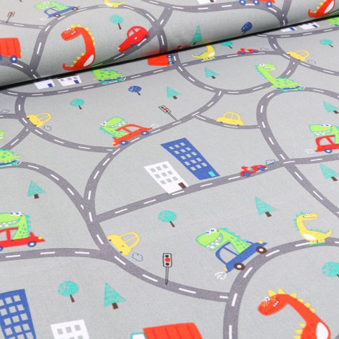 Tissu Coton imprimé Dinosaures en ville sur fond Gris