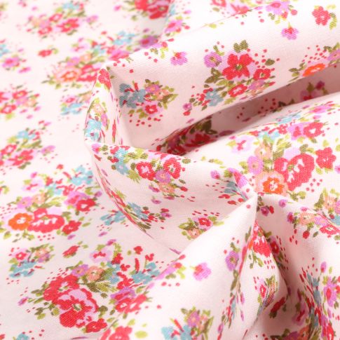 Tissu Popeline de coton Bouquet printanier rose sur fond Blanc