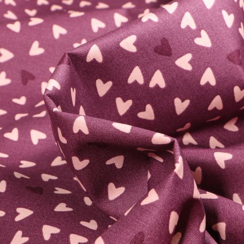 Tissu Coton imprimé Petits cœurs rose pâle sur fond Prune