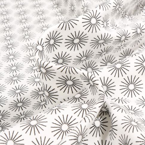 Tissu Jersey Coton Camille soleils noirs sur fond Blanc
