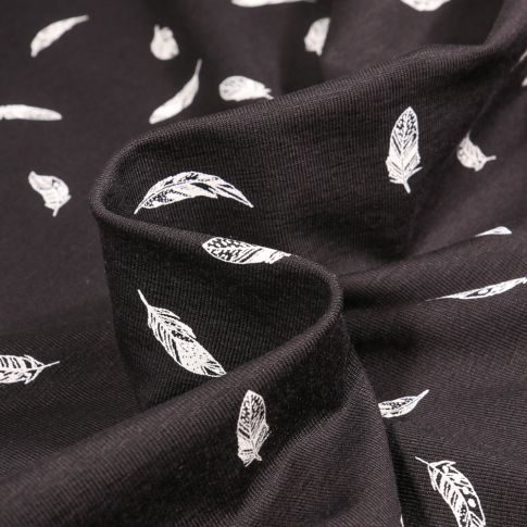 Tissu Jersey Coton Camille Plumes blanches sur fond Noir