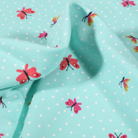 Tissu Jersey Coton Papillons et petits pois blanc sur fond Bleu lagon
