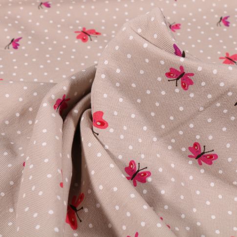 Tissu Jersey Coton Papillons et petits pois blanc sur fond Beige