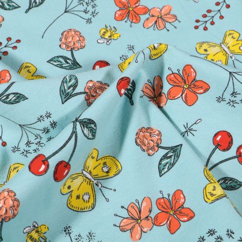 Tissu Jersey Coton Papillons cerises et fleurs sur fond Bleu ciel