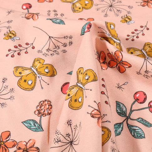 Tissu Jersey Coton Papillons cerises et fleurs sur fond Rose saumon
