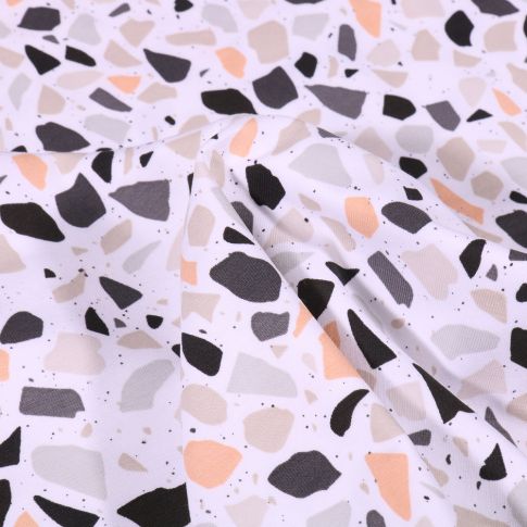 Tissu Jersey Coton Terrazzo gris beige sur fond Blanc