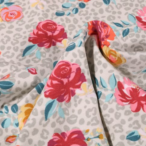 Tissu Jersey Coton Tâches léopard et fleurs colorées sur fond Gris clair