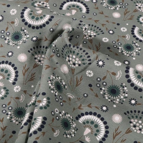 Tissu Jersey Coton Pissenlit stylisé sur fond Vert kaki clair