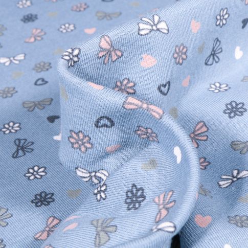 Tissu Jersey Coton Petits nœuds et cœurs sur fond Bleu layette