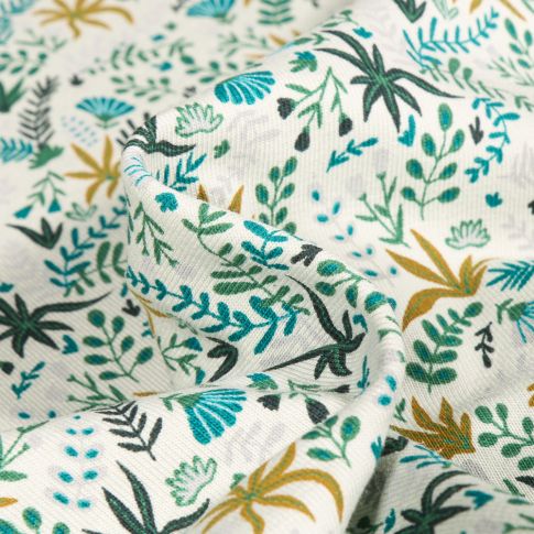 Tissu Jersey Coton Feuilles de palmier sur fond Blanc cassé