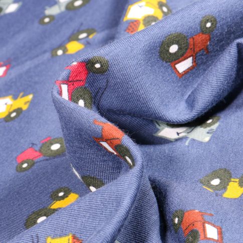 Tissu Jersey Coton Tracteurs colorés sur fond Bleu