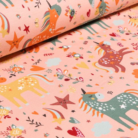 Tissu Jersey Coton Licornes étoiles et coeurs sur fond Rose saumon