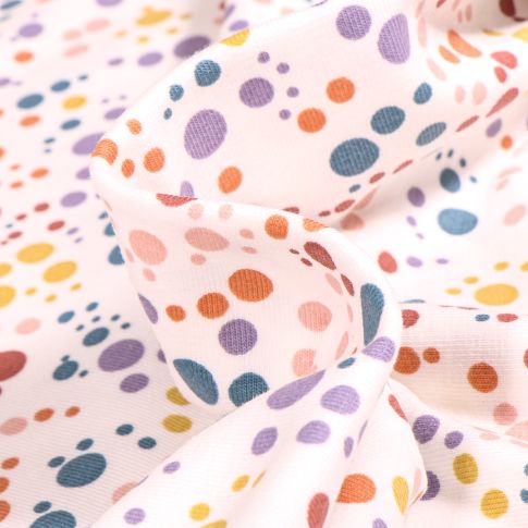 Tissu Jersey Coton Confettis pastel sur fond Blanc cassé