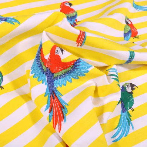 Tissu Jersey Coton Rayures larges jaunes et perroquets colorés sur fond Blanc