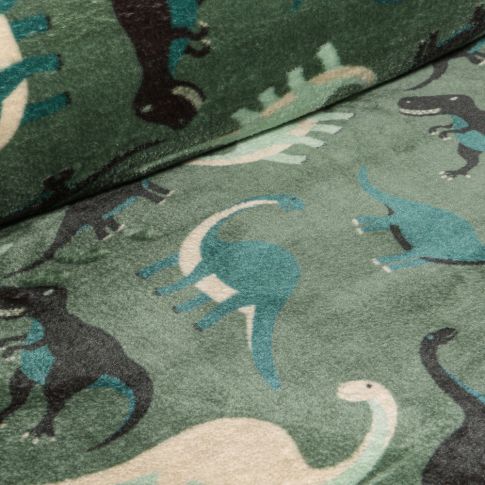 Tissu Doudou Tribu de Dino sur fond Vert