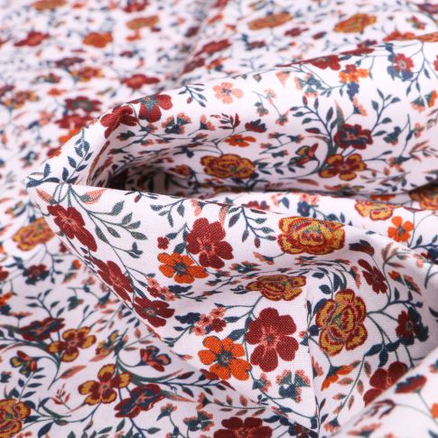 Tissu Popeline de coton Sweet Flower Faustine orange sur fond Blanc