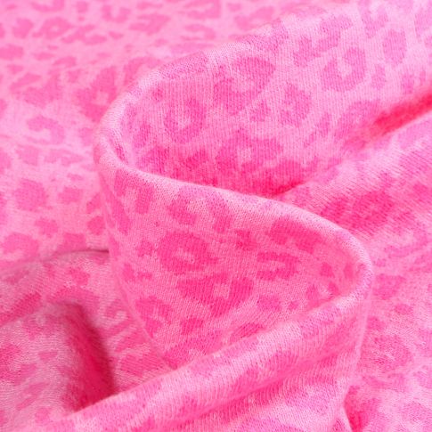 Tissu Jersey  jacquard Tache léopard rose sur fond Rose