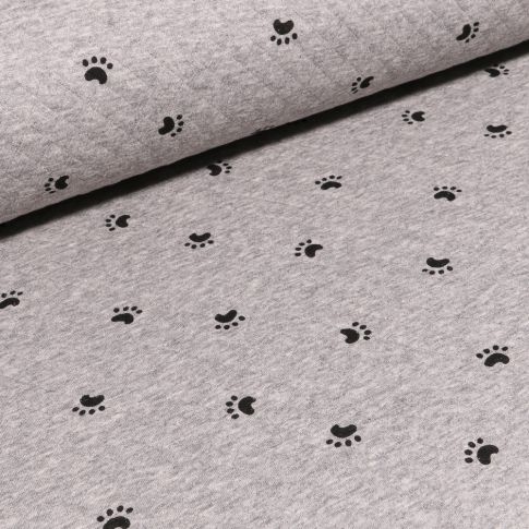 Tissu Sweat matelassé Empreintes sur fond Gris chiné
