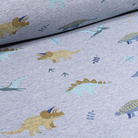 Tissu  Sweat envers minky Dinosaures et feuilles sur fond Bleu chiné
