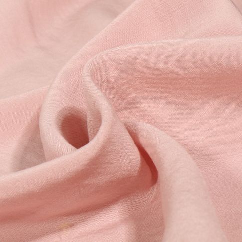 Tissu Viscose Lin Uni Lino sur fond Rose pâle