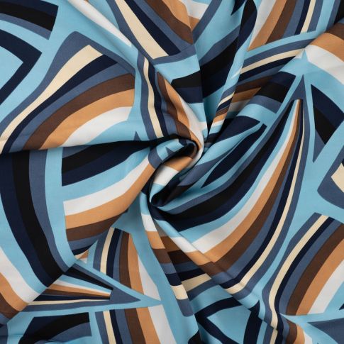 Tissu Viscose satiné Op art sur fond Bleu denim