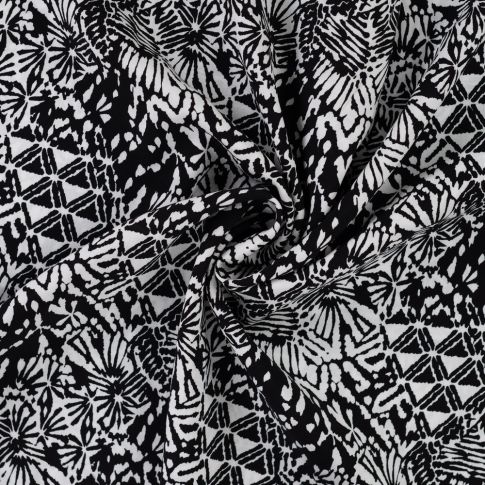 Tissu Viscose imprimé Motifs blancs destructurés sur fond Noir