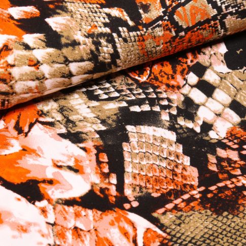 Tissu Viscose Twill Reptiles colorés orange sur fond Noir