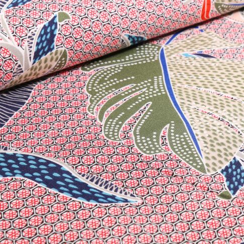 Tissu Viscose Feuilles philodendron colorées sur fond Rouge