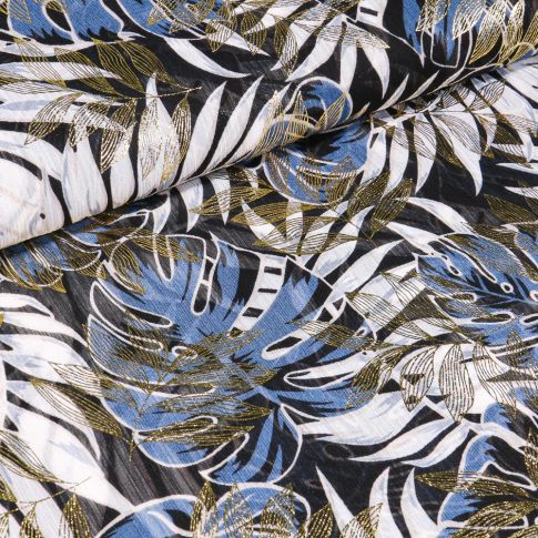 Tissu Crêpe georgette Végétations tropicales bleu et dorés sur fond Noir