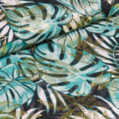 Tissu Crêpe georgette Végétations tropicales menthe et dorés sur fond Noir