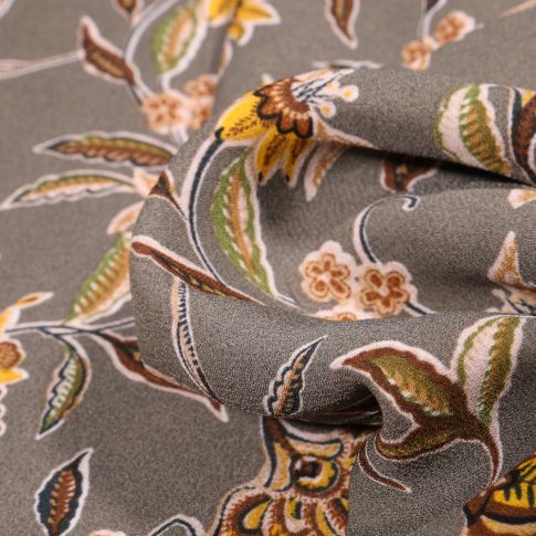 Tissu Crêpe georgette Fleurs et feuilles sur fond Taupe