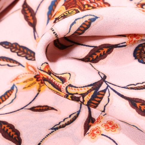 Tissu Crêpe georgette Fleurs et feuilles sur fond Rose