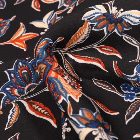 Tissu Crêpe georgette Fleurs et feuilles sur fond Noir