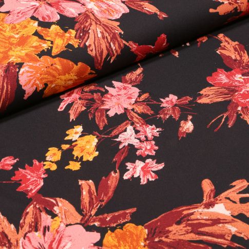 Tissu Crêpe georgette Alba orange sur fond Noir