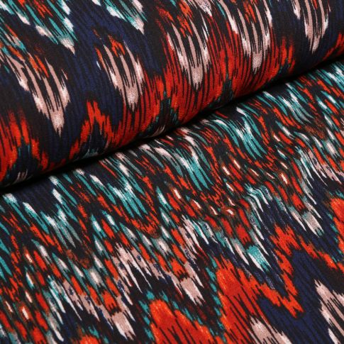 Tissu Crêpe georgette Chevrons rouges et turquoise sur fond Bleu