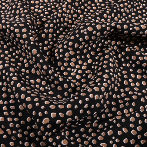 Tissu Viscose légère Pois destructurés beige sur fond Noir