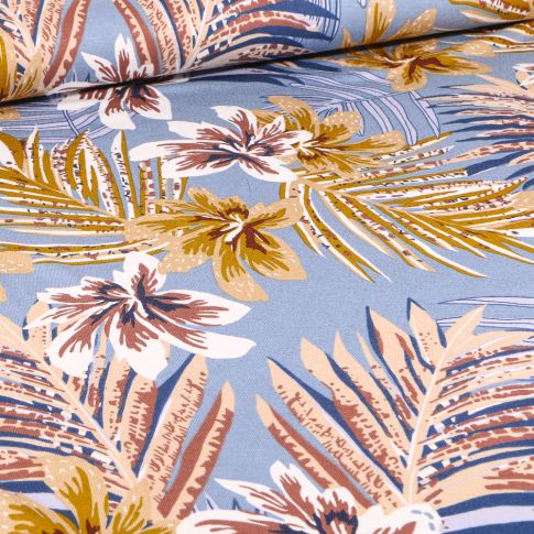 Tissu Jersey Viscose Feuilles tropicales colorées sur fond Bleu lavande