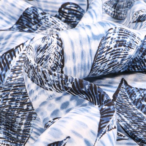 Tissu Viscose légère Plumes et feuilles Noir sur fond Bleu
