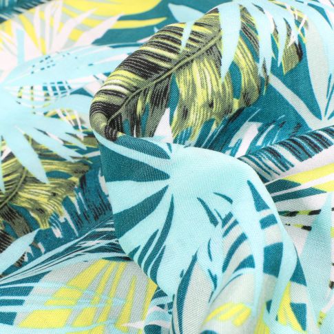 Tissu Viscose légère Plume et Jungle vert sur fond Bleu