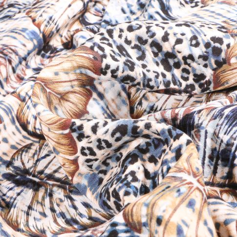 Tissu Viscose aspect lin Feuille monstera Bleu sur fond Blanc