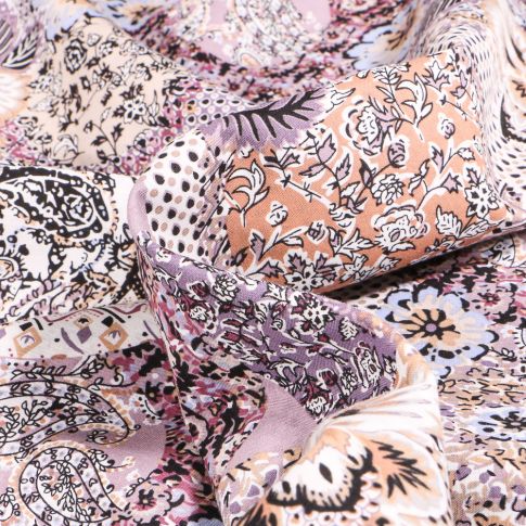 Tissu Voile de coton Motifs aztèques et fleuris mauve sur fond Blanc