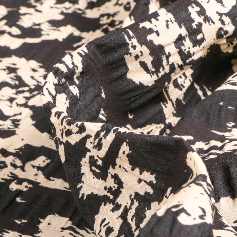 Tissu Seersucker Motifs abstraits ecru sur fond Noir