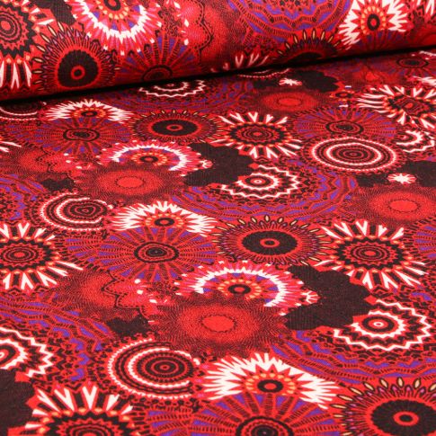 Tissu Jersey Viscose  Fantasia sur fond Rouge