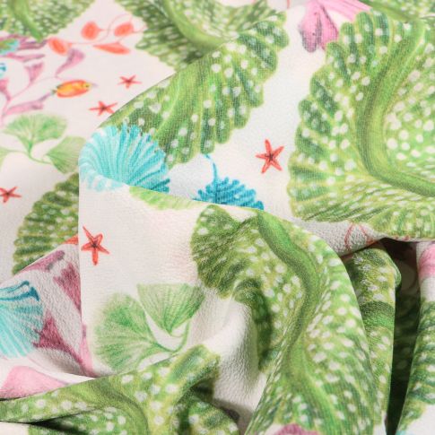 Tissu Crêpe Georgette Grandes feuilles tropicales sur fond Blanc