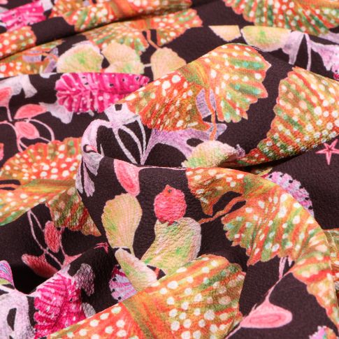 Tissu Crêpe Georgette Grandes feuilles tropicales sur fond Noir