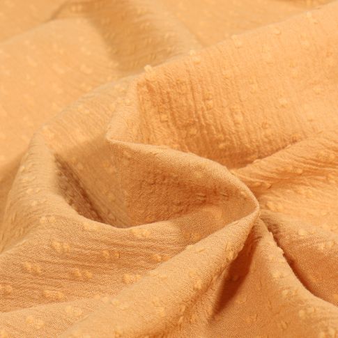Tissu Voile de Coton Plumetis uni Ocre