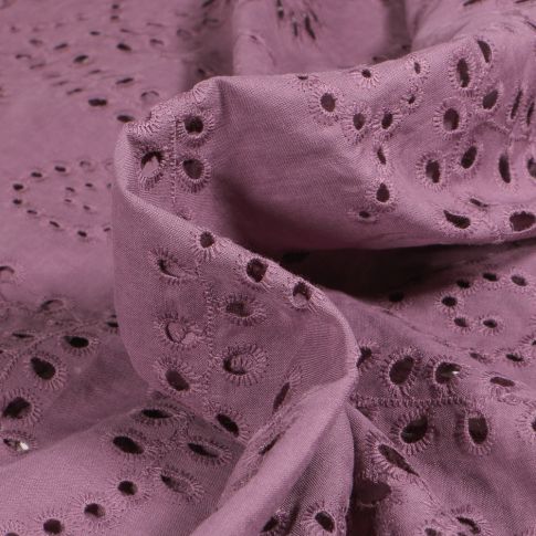 Tissu Broderie anglaise Motifs ajourés sur fond Violet